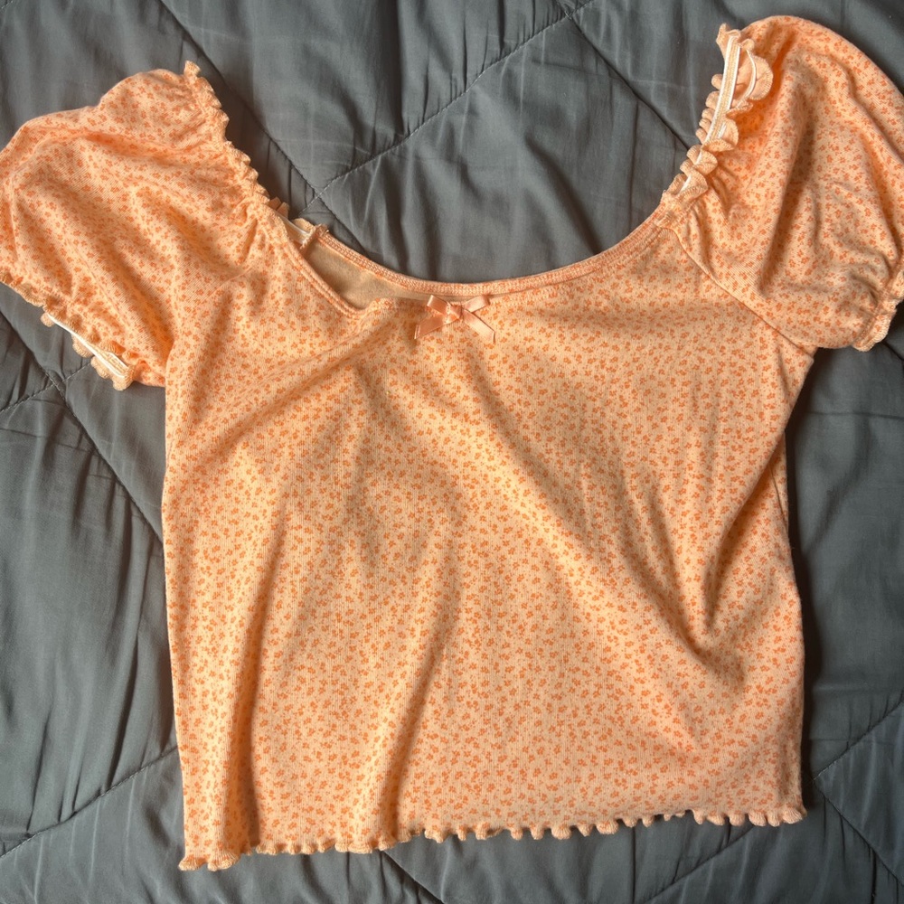 American Eagle top with puffy shoulders.